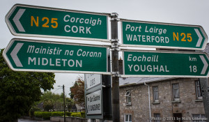A road sign in Castlemartyr, Ireland. Cork, Midleton, and Waterford all have distilleries either operating or under construction. Photo ©2011 by Mark Gillespie.
