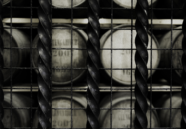 Barrels being held behind bars (for their own protection) at Glen Garioch Distillery in Scotland. Photo ©2016, Mark Gillespie/CaskStrength Media. Barrels being held behind bars (for their own protection) at Glen Garioch Distillery in Scotland. Photo ©2016, Mark Gillespie/CaskStrength Media.
