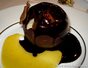 A chocolate covered pear and ice cream dessert with a whisky sauce prepared during Whisky Live Paris in 2008.