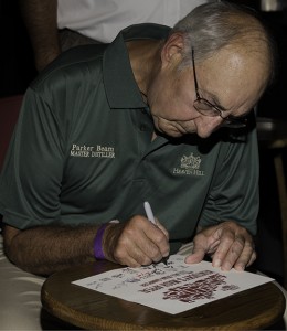 Parker Beam, Heaven Hill Master Distiller and the winner of Whisky Magazine's U.S. Distillery Manager of the Year Icons of Whisky Award for 2014, signs autographs during the Kentucky Distillers Association All-Star Sampler event at the Kentucky Bourbon Festival, September 18, 2013. Photo ©2013 by Mark Gillespie.