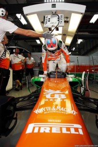 Paul Di Resta climbs out of the 2013 Sahara Force India F1 car during practice for the Indian Grand Prix in October, 2013. Image courtesy Sahara Force India. 