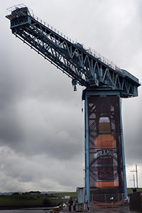 Whyte & Mackay's Lion's Clyde Pub on top of a shipping crane along the River Clyde June 2, 2014. Image courtesy Whyte & Mackay/Andy Buchanan.