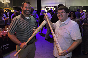 WhiskyCast listeners Sean and Michael display their autographed custom Louisville Slugger bats during the Kentucky Bourbon Festival September 17, 2014. Photo ©2014 by Mark Gillespie. 