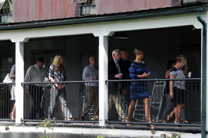 Visitors tour a warehouse at Stitzel-Weller Distillery in Louisville as part of the Bulleit Frontier Whiskey Experience September 15, 2014. Photo ©2014 by Mark Gillespie.