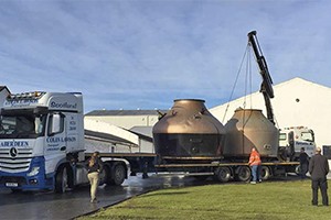 Workers at Bruichladdich load the former Inverleven Distillery stills onto a truck to be taken to Forsyths for refurbishment. The stills will be used in Mark Reynier's new Waterford Distillery in Ireland. Photo courtesy Mark Reynier. 