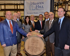 Heaven Hill executives celebrate the filling of the company's seven millionth barrel of whiskey in a ceremony February 10, 2015. Image courtesy Heaven Hill Brands. 
