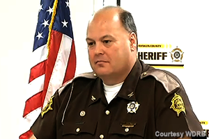 Franklin County Sheriff Pat Melton addresses reporters following the indictments of nine people in a series of Bourbon thefts dating back to 2008. Image courtesy WDRB-TV.