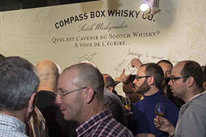 French whisky drinkers at the Compass Box booth during Whisky Live Paris September 28, 2015. Photo ©2015 by Mark Gillespie. 