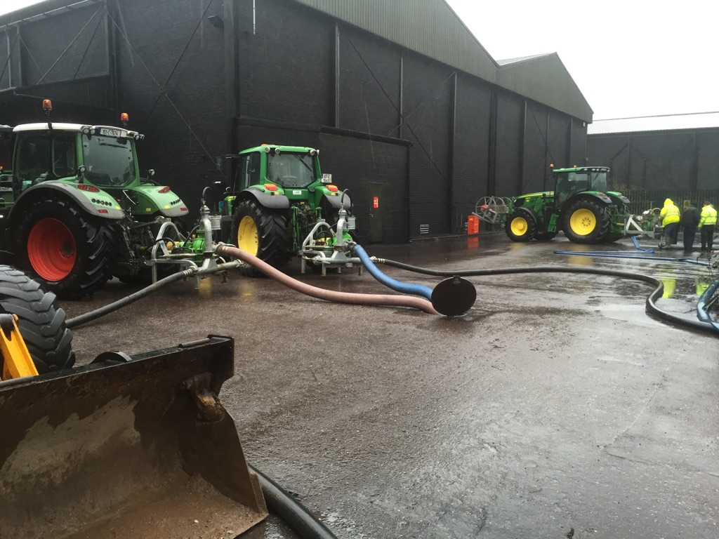 Workers pump flood water from the maturation warehouses at Ireland's Midleton Distillery. Photo courtesy Irish Distillers. 