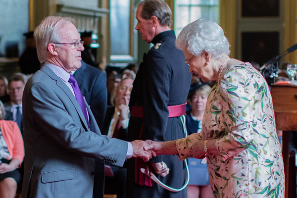 The Balvenie's David Stewart receives his appointment as a member of the Order of the British Empire (MBE) from Queen Elizabeth July 5, 2016 in Edinburgh. Photo courtesy British Ceremonial Arts Ltd. via William Grant & Sons.