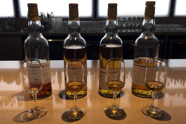 Four of Bruichladdich's new single malts on the bar at Rémy Cointreau's New York office. Photo ©2016, Mark Gillespie/CaskStrength Media.