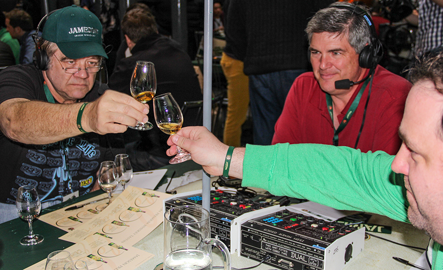 Col. St. James of 93.7 The Arrow in Houston and Paul Driscoll of WFNX in Boston raise a glass during the WhiskyCast Virtual Tastings session at the Old Jameson Distillery in Dublin, Ireland on March 16, 2012.