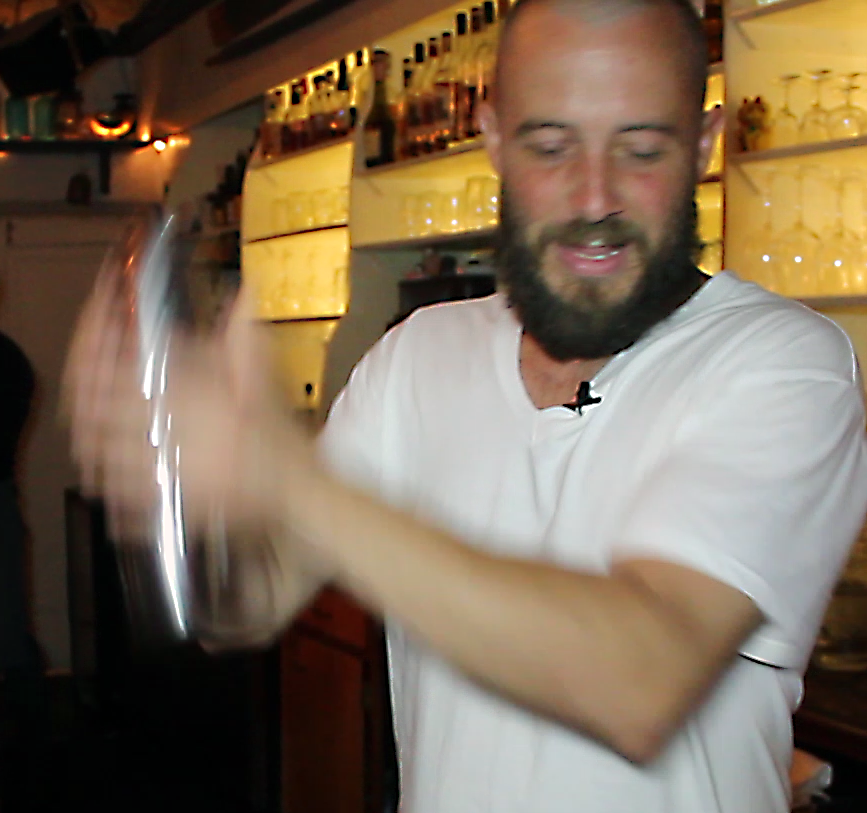 A bartender mixes whisky cocktails at "The Drink" in Brooklyn, New York.