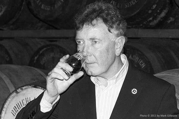 Jim McEwan nosing a glass of whisky. File photo ©2023, Mark Gillespie/CaskStrength Media.