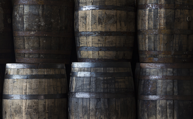 Whisky barrels waiting to be filled in Scotland. Photo ©2015 by Mark Gillespie.