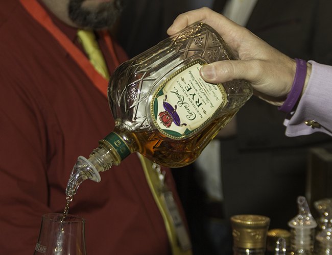 A bartender pours Crown Royal Northern Harvest Rye during the recent Whisky Live New York. Photo ©2016, Mark Gillespie.