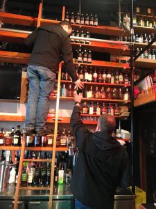 British Columbia Liquor Control & Licensing Branch agents seize Scotch Malt Whisky Society bottles from Fets Whisky Kitchen in Vancouver January 18, 2018. Photo courtesy Fets Whisky Kitchen.
