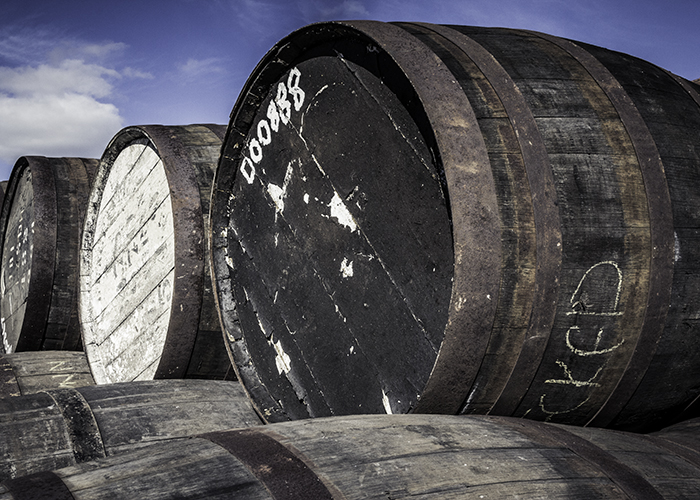 Will 2018 be a bright, sunny year for the whisky industry, or will it be a year more like the label on the barrel at top right. Photo ©2016, Mark Gillespie/CaskStrength Media.