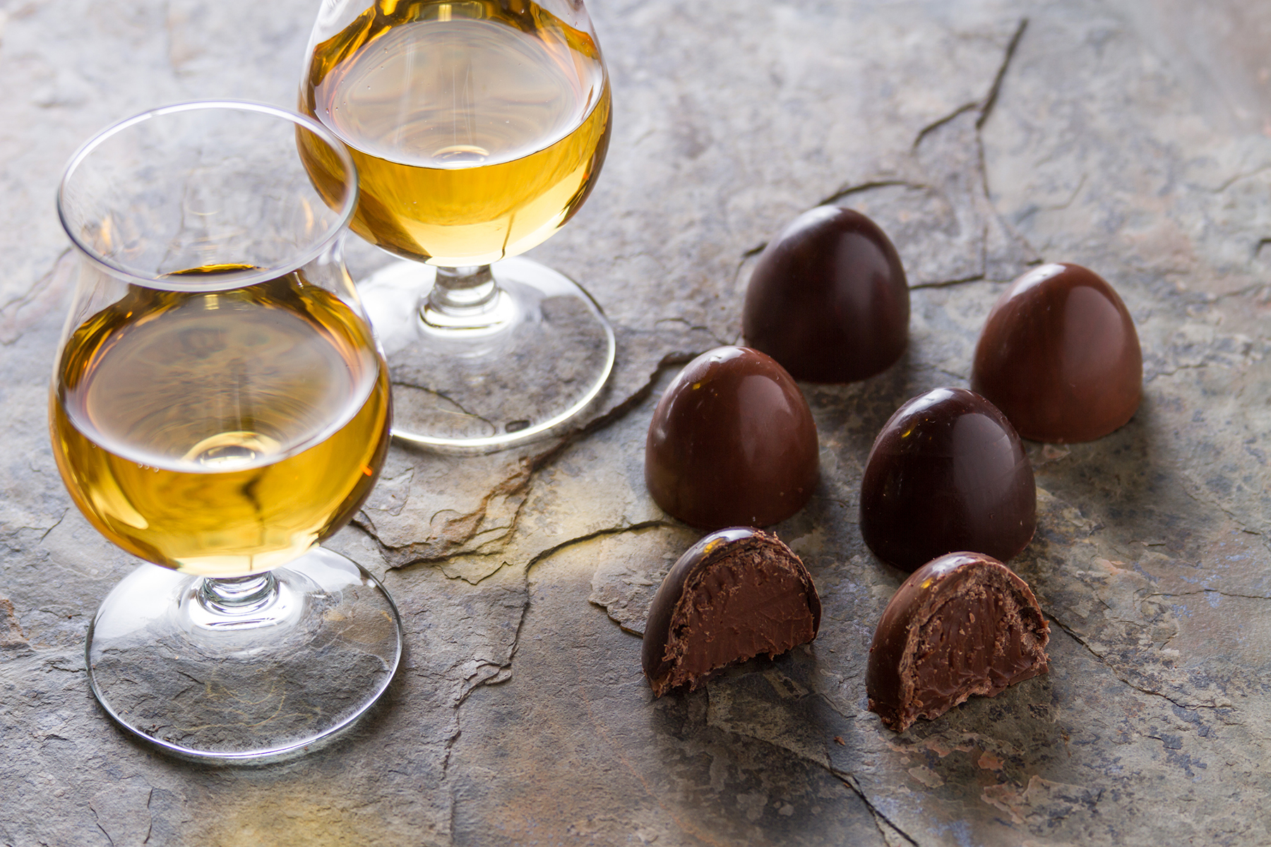 Whisky glasses and chocolates. Image courtesy Shutterstock.