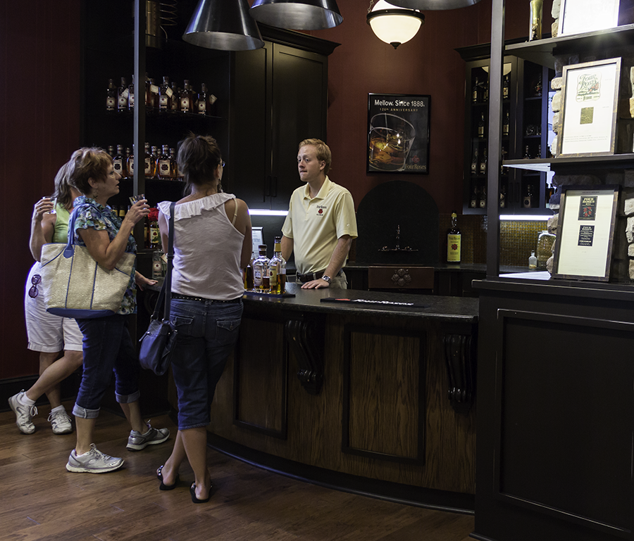 A Four Roses Distillery bartender talks with guests at the distillery's visitors center. File photo ©2018, Mark Gillespie/CaskStrength Media.