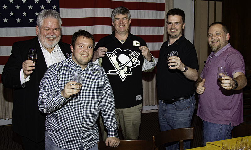 Panelists Rick Seback, Bobby Long, Scott Ritenbaugh, and Christian Kahle with WhiskyCast's Mark Gillespie (C) at the HIAS Benefit Tasting on November 26, 2018 in Pittsburgh, Pennsylvania. Photo ©2018/CaskStrength Media.