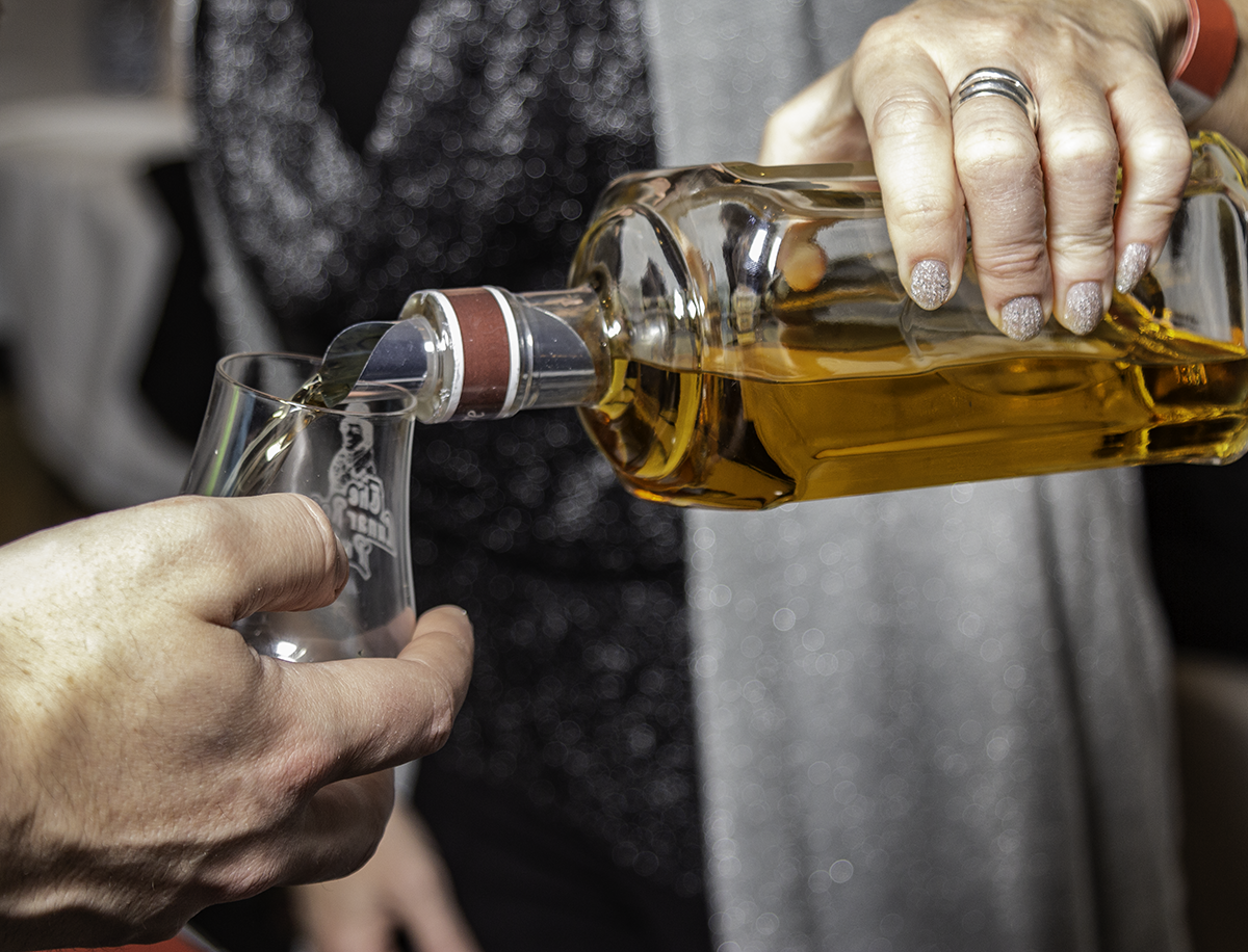 Whisky being poured during the New Brunswick Spirits Festival November 16, 2018. Photo ©2018, Mark Gillespie/CaskStrength Media.