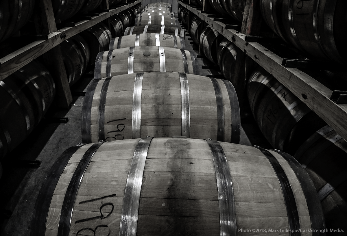 Barrels of maturing whiskey lined up on the rickhouse floor at the Balcones Distilling warehouse in Waco, Texas. Photo ©2018, Mark Gillespie/CaskStrength Media.