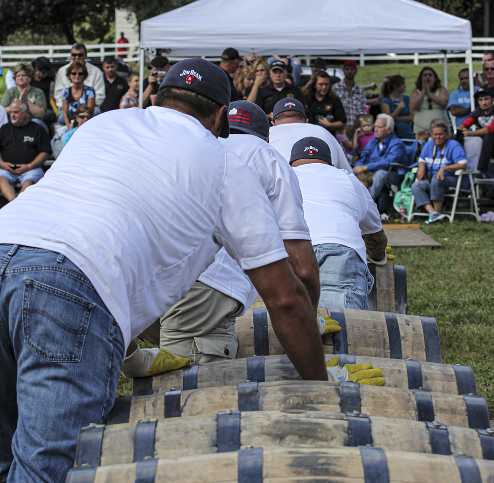 Members of the Jim Beam Distillery barrel rolling team compete in the team competition during the 2013 World Championship Bourbon Barrel Relay during the Kentucky Bourbon Festival. Photo ©2020, Mark Gillespie/CaskStrength Media.