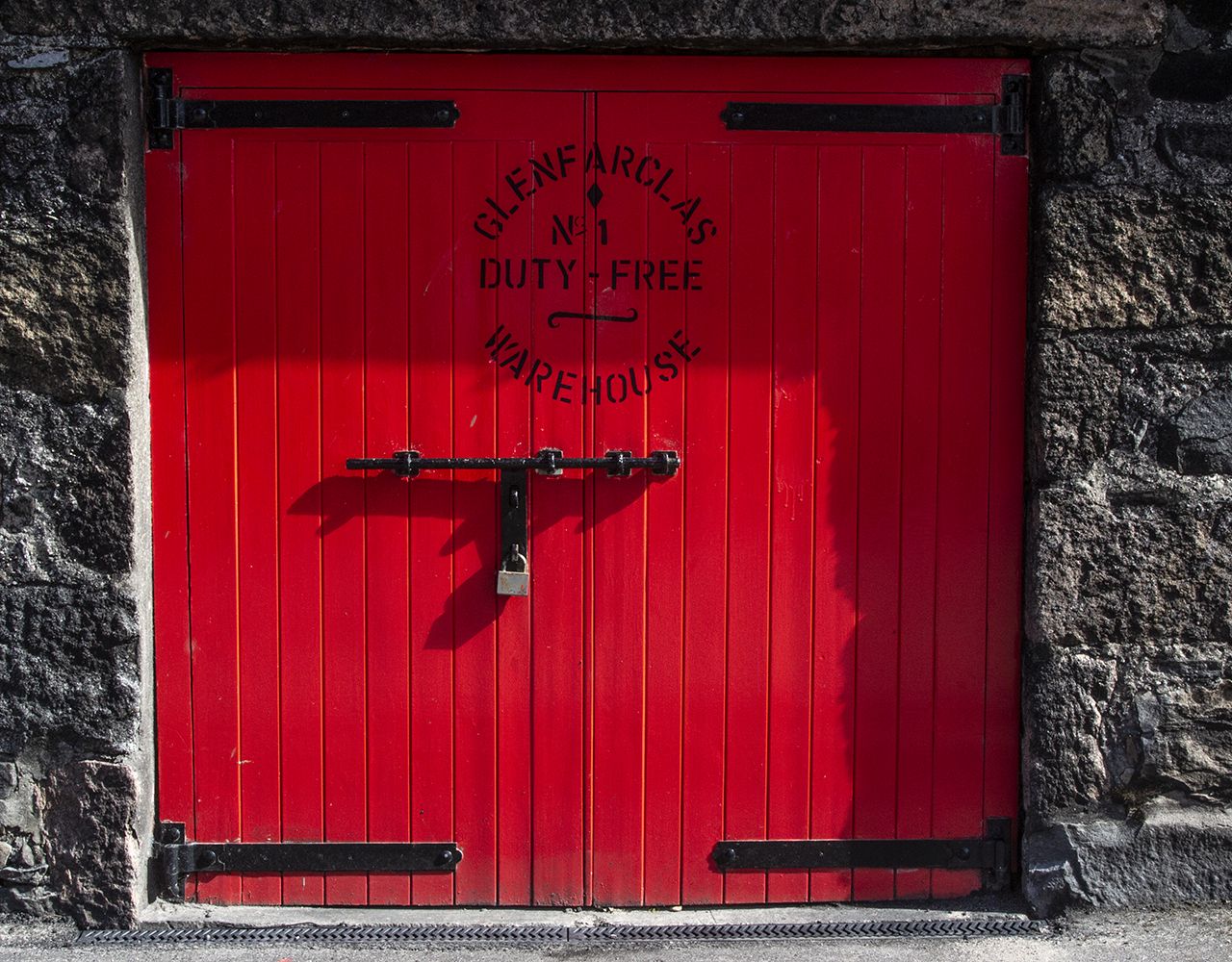The locked door of Warehouse No. 1 at Glenfarclas Distillery in Scotland. File photo ©2020, Mark Gillespie/CaskStrength Media.