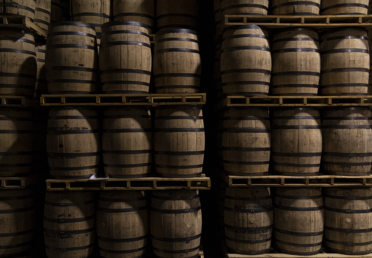 There are two ways to store barrels of maturing whisky: on their sides or on their ends. Dunnage-style warehouses and rick houses store barrels on their sides, while "palletized" warehouses store barrels stacked in pallets of six. Each style has its own proponents, and a few distilleries use both methods, including Diageo's Cascade Hollow (George Dickel) Distillery in Tennessee where this photo was made. We'll discuss the two styles in the Behind the Label segment on this week's WhiskyCast. Photo ©2020, Mark Gillespie, CaskStrength Media. There are two ways to store barrels of maturing whisky: on their sides or on their ends. Dunnage-style warehouses and rick houses store barrels on their sides, while "palletized" warehouses store barrels stacked in pallets of six. Each style has its own proponents, and a few distilleries use both methods, including Diageo's Cascade Hollow (George Dickel) Distillery in Tennessee where this photo was made. We'll discuss the two styles in the Behind the Label segment on this week's WhiskyCast. Photo ©2020, Mark Gillespie, CaskStrength Media.