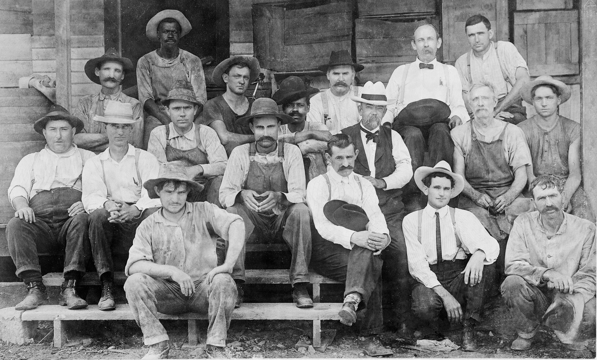 The Jack Daniel Distillery team in a 1900-era photo, with Nearest Green's son George seated next to Jack Daniel. Image courtesy Brown-Forman.