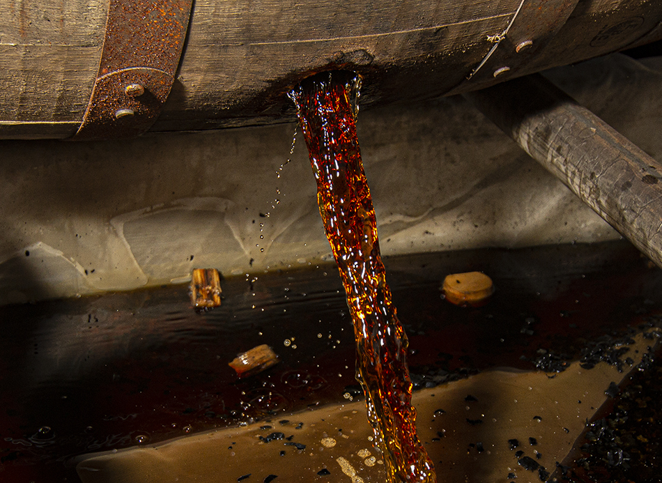 Bourbon pours out of a barrel ready for bottling. File photo ©2021, Mark Gillespie/CaskStrength Media.