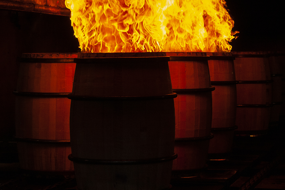American White Oak barrels being charred at the Brown-Forman Cooperage in Louisville, Kentucky. File photo ©2022, Mark Gillespie/CaskStrength Media.