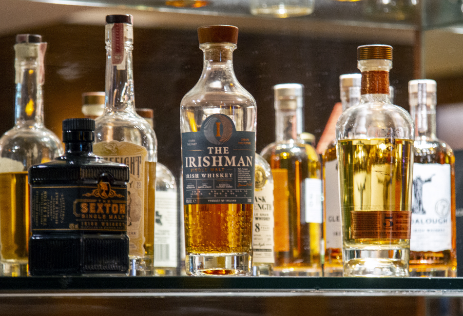 Irish whiskies on a bar shelf in Dublin. Photo ©2022, Mark Gillespie/CaskStrength Media.
