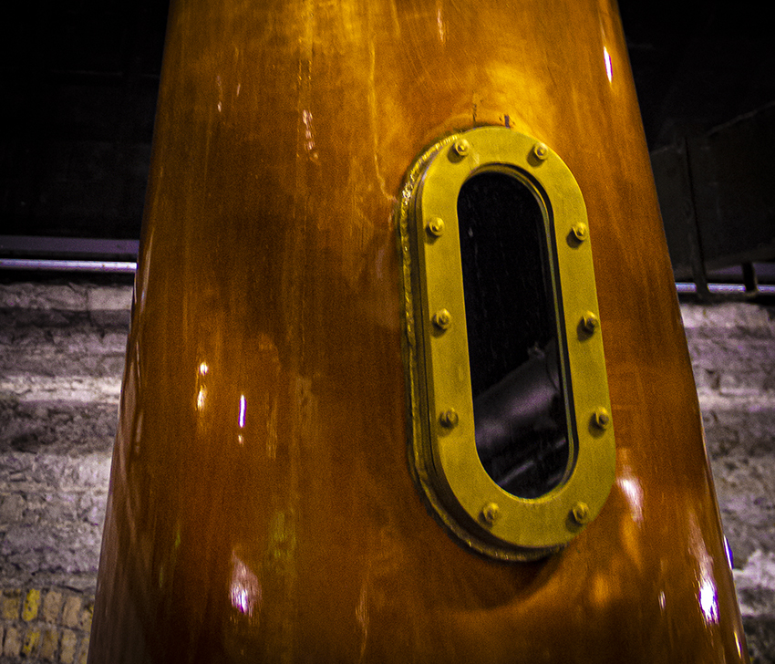 Copper stills add character to whisky, but in the right light, they add character to a photograph as well with subtle reflections of the stillhouse, such as this still in the microdistillery at Ireland's Midleton Distillery. Photo ©2021, Mark Gillespie/CaskStrength Media.