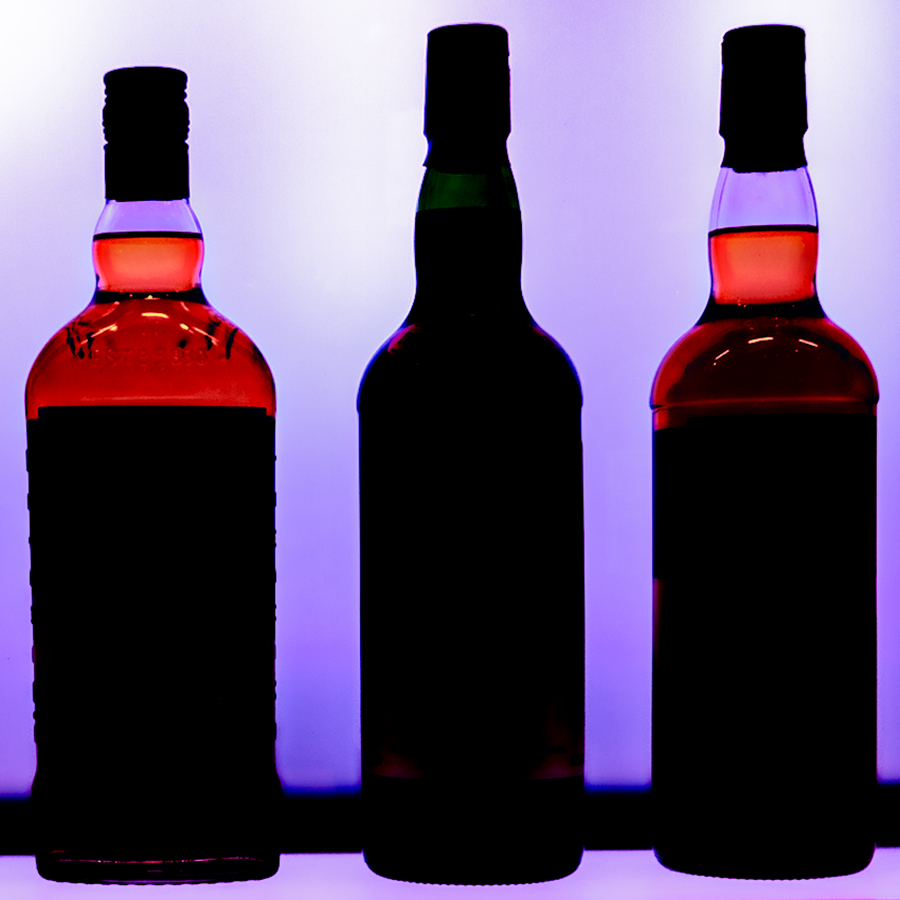 Whisky bottles in silhouette. File photo ©2023, Mark Gillespie/CaskStrength Media.
