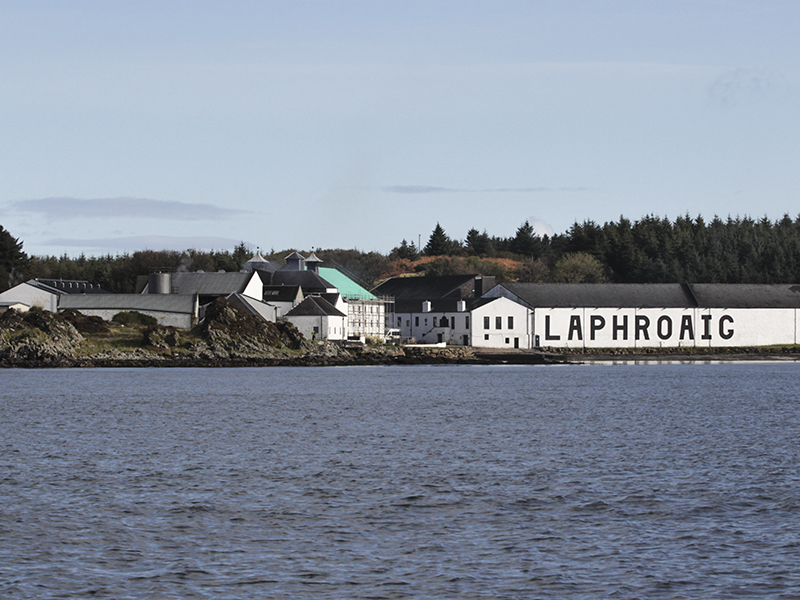 Laphroaig Distillery as seen from the water. File photo ©2024, Mark Gillespie/CaskStrength Media.