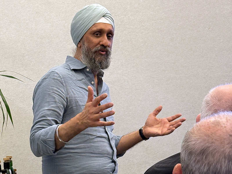 Sukhinder Singh speaking at a Manhattan Whisky Club meeting. Photo ©2026, Mark Gillespie/CaskStrength Media.